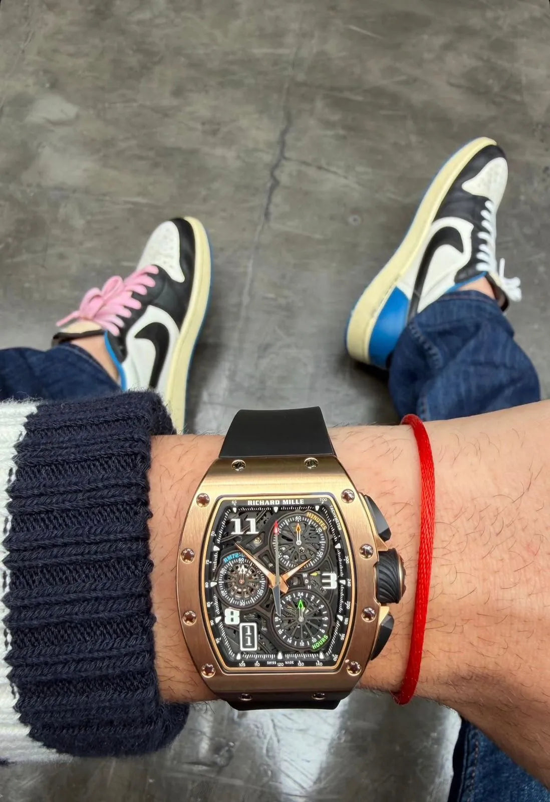 A customer wearing a Richard Mille watch